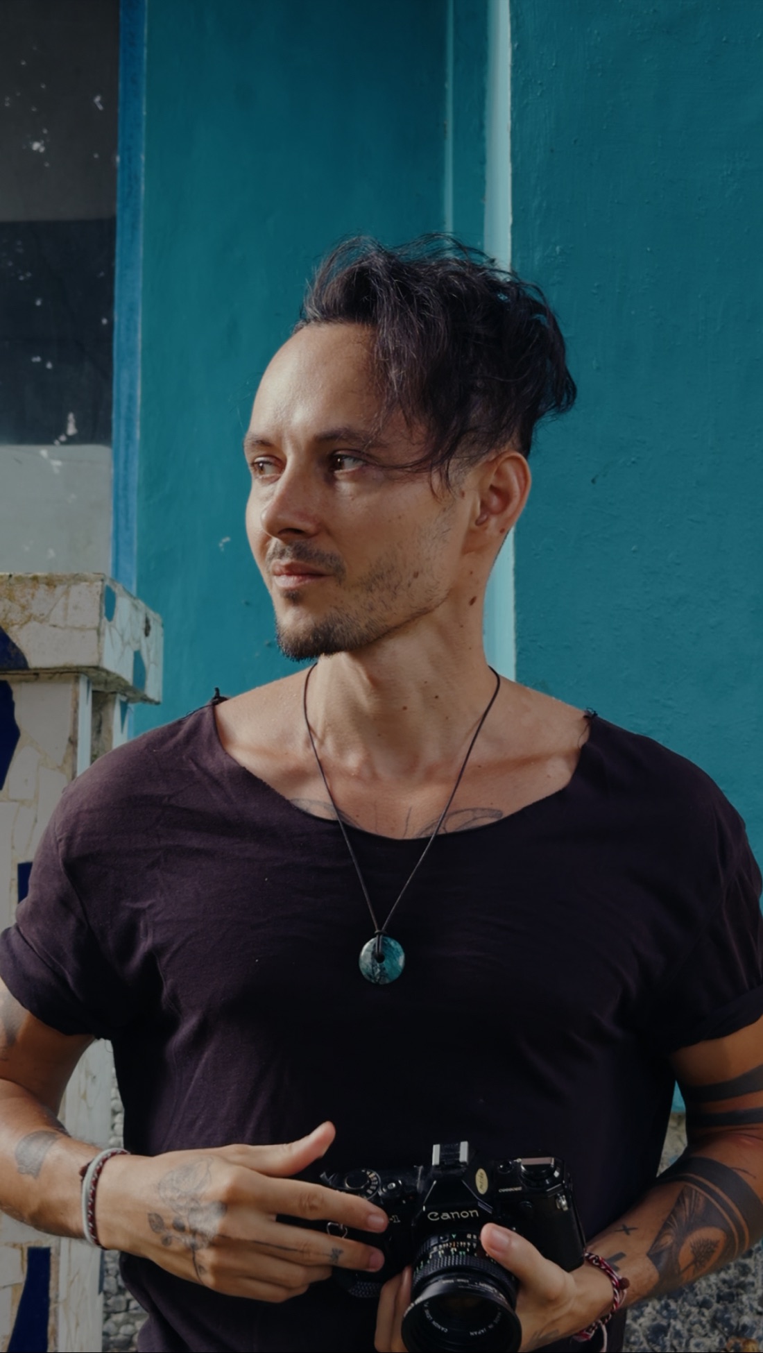 Andrei Topli holding a film camera